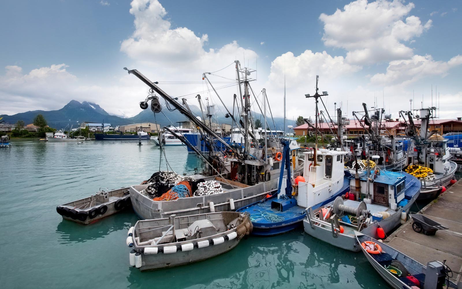 Commercial fishing boats moored in an Alaskan harbor