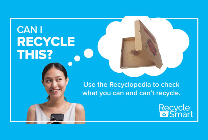 Digital ad photo for Recycle Smart showing a woman thinking about whether a pizza box is recyclable. Use the Recyclopedia to check what you can and can't recycle.